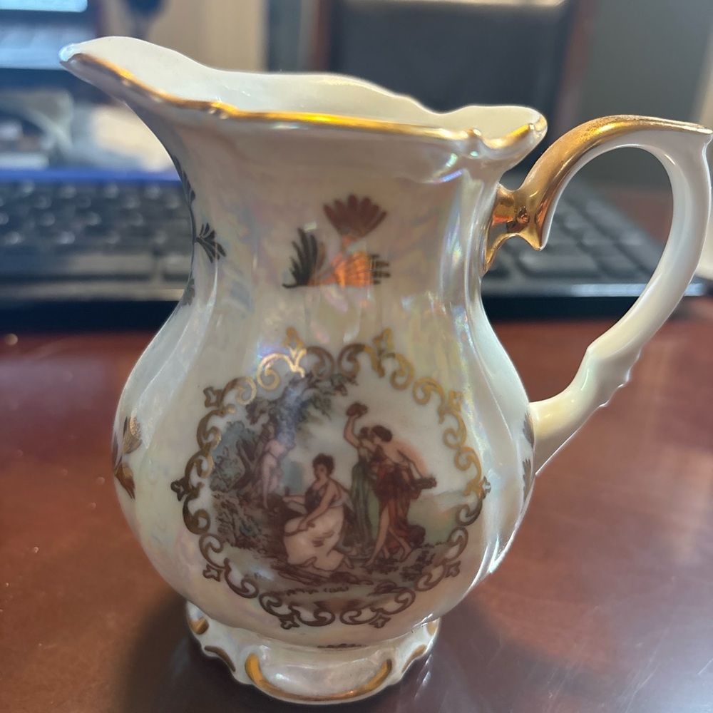 Elegant Gold and Cream Porcelain Pitcher
